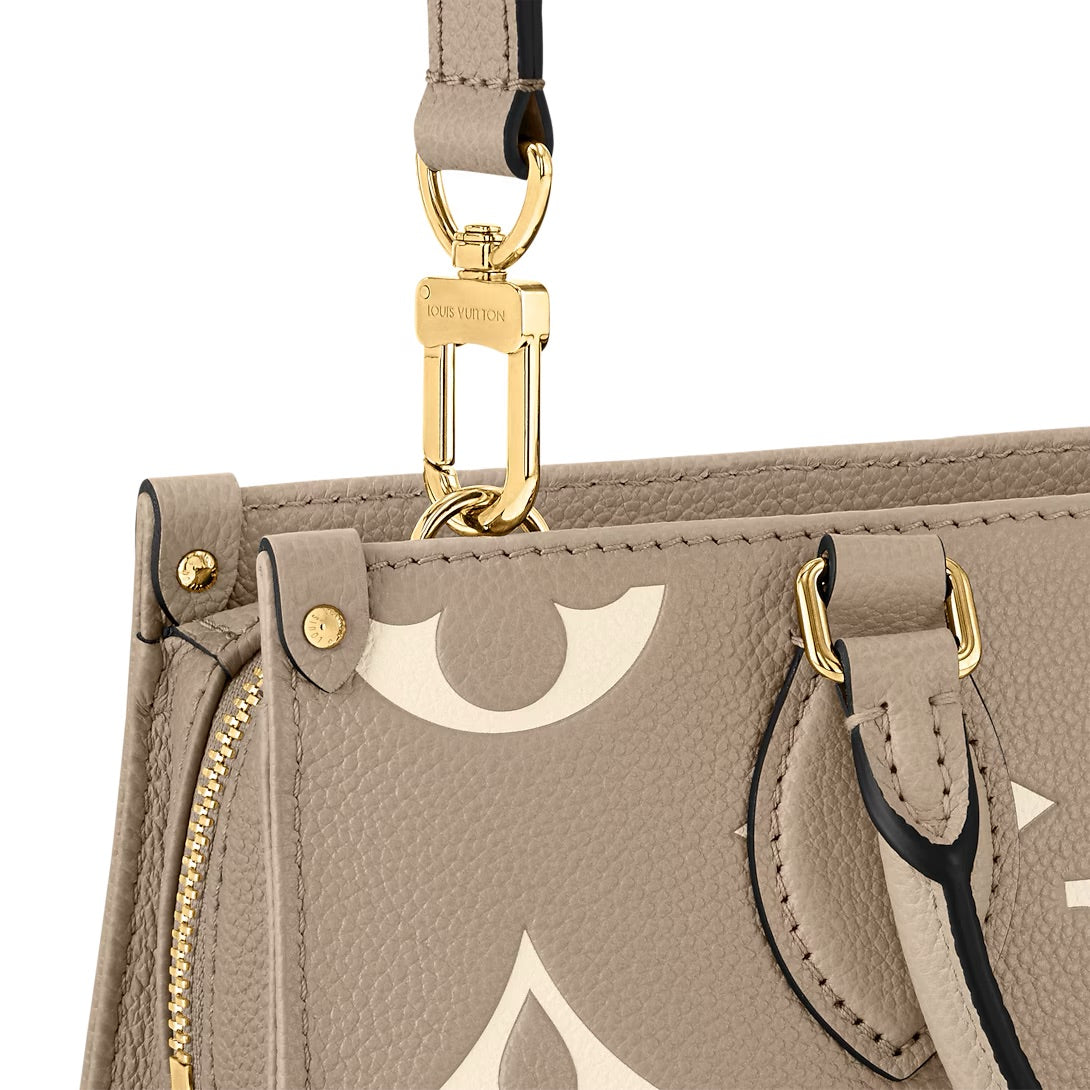 Louis Vuitton OnTheGo East West Cream Monogram Empreinte Leder (M23641)