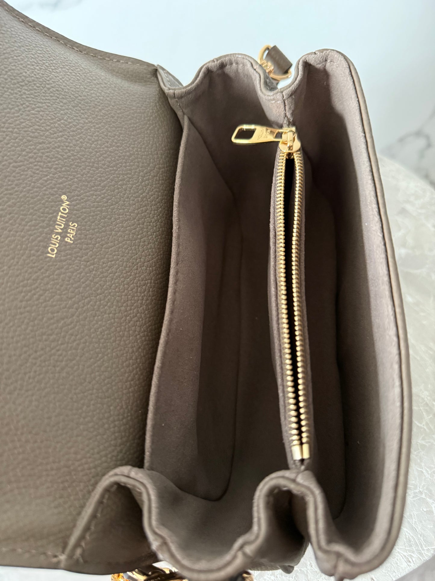 Louis Vuitton Pochette Metis East West Smoke M25910